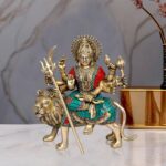 Divine Craftsmanship for Spiritual Ambience – AONA Brass Durga Idol for Temple and Home Puja